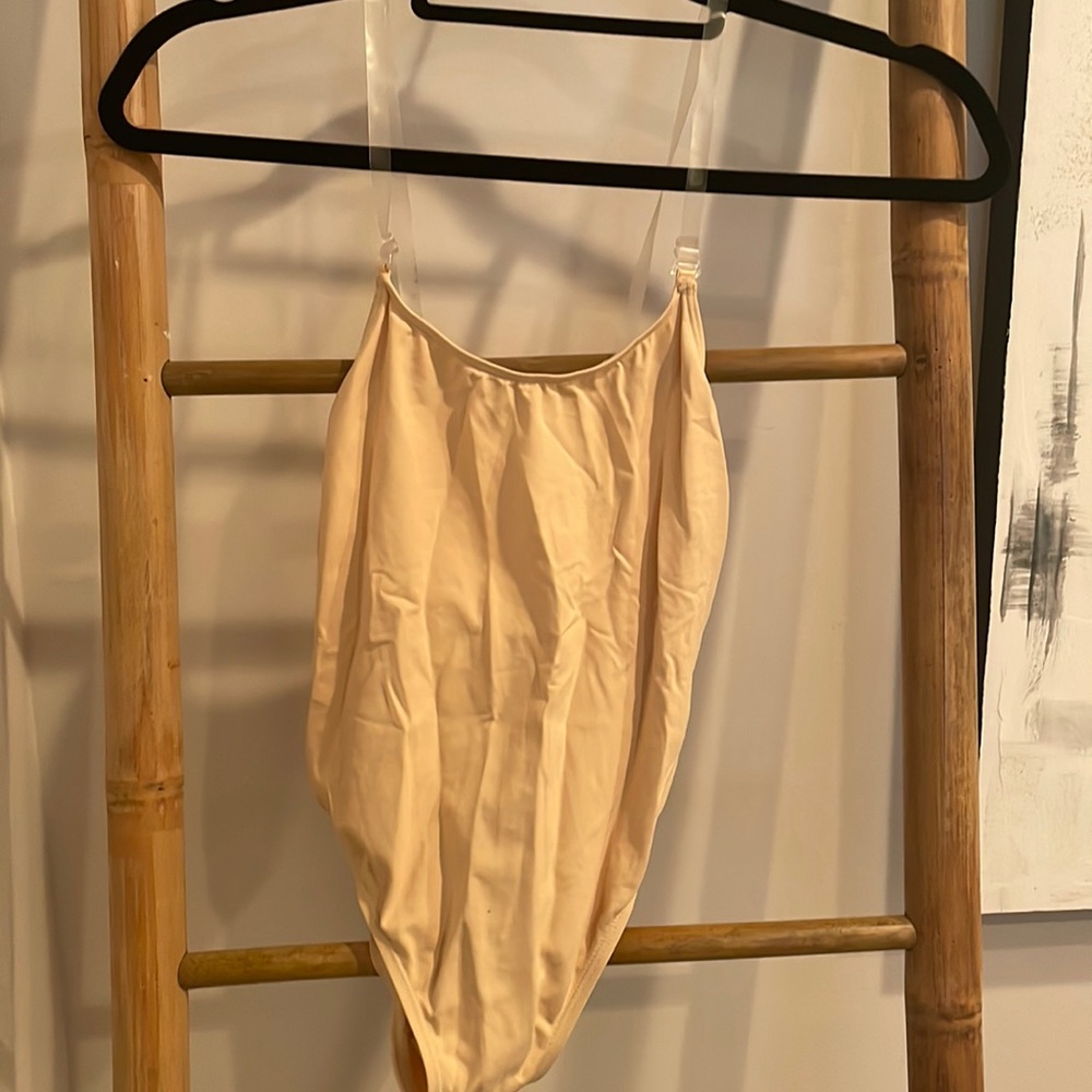 Nude leotard with adjustable straps